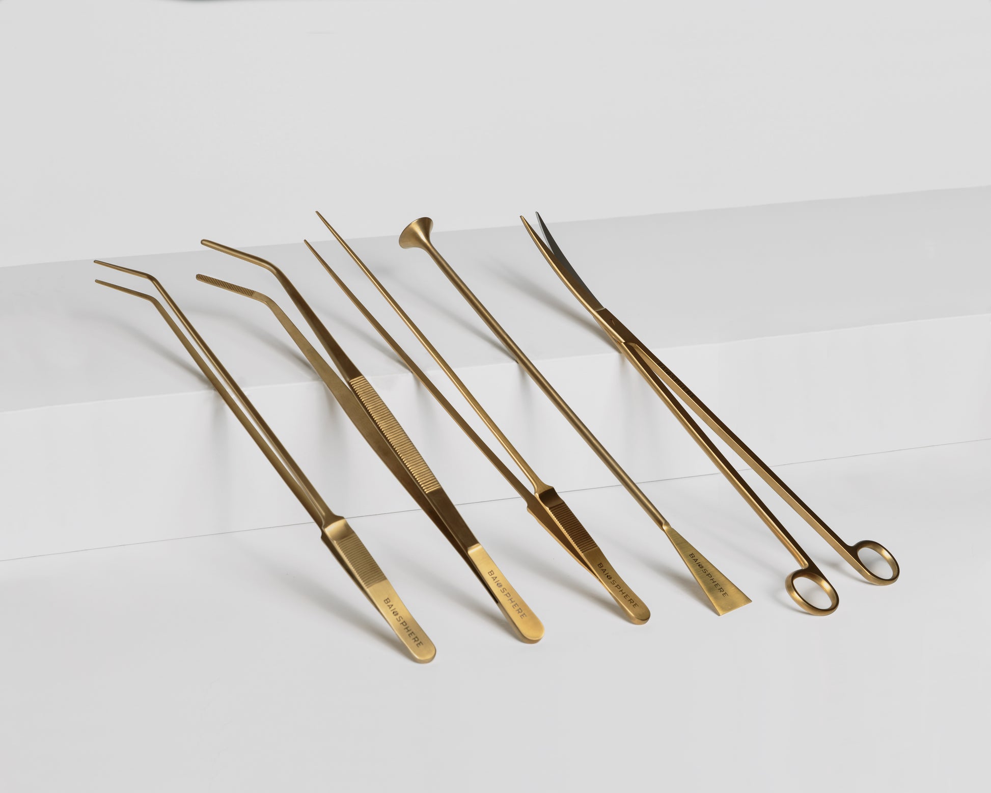 Baiosphere scaping tools set in gold